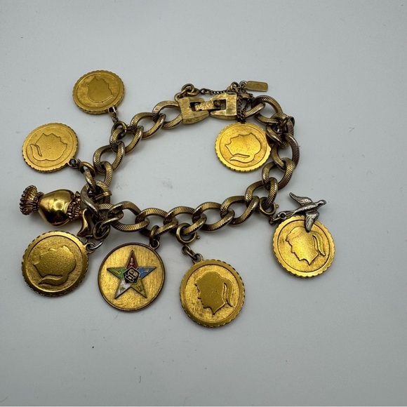 Vintage Monet Gold Tone Charm Bracelet with 9 Charms Easter Star Safety Chain - Picture 2 of 8